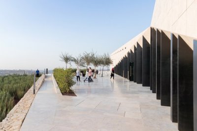 archatlas:<br />Palestinian Museum in Birzeit<br />The landscape of the Palestinian Museum by Heneghan Peng has the ‘worked’ quality of a city; every element of it has been touched and tells a story of intervention, production, culture, environment, commerce. Like a city, the terraced landscape has embedded within it its history. The approach to the Palestinian Museum is to draw on this history of the terraced landscape, embedding the museum into its immediate site and drawing from this site to tell a larger story of a diverse culture.<br />The cascade of terraces tells a diversity of stories, citrus brought in through trade routes, native aromatic herbs, a rich and varied landscape with connections east and west. The building itself emerges from the landscape to create a strong profile for the hilltop both integrated into the landscape yet creating an assertive form that has a distinctive identity.<br /><br /><br />Follow the Source Link for images sources and more information. <br /><br /><br />