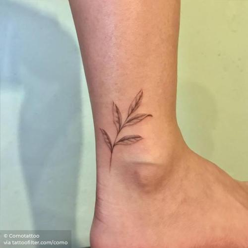 By Comotattoo, done in Seoul. http://ttoo.co/p/29191 flower;small;single needle;leaf;sprig;ankle;como;facebook;nature;twitter;illustrative