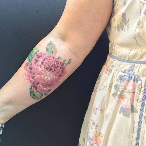 Cross stitch red rose tattoo on the right inner forearm. Tattoo... flower;small;evakrbdk;tiny;rose;little;nature;embroidery;cross stitch;inner forearm;medium size