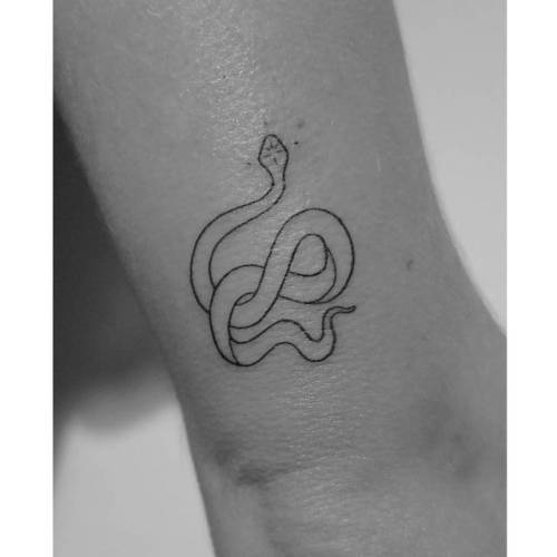 By Lily Gloria, done at Full Moon Tattoo, Melbourne.... small;lilygloria;animal;tricep;tiny;snake;hand poked;ifttt;little