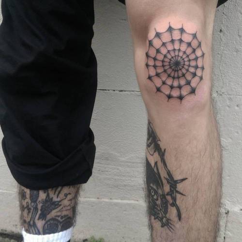 Spiderweb tattoo on the left knee. Tattoo artist: Domino Daily fine line;small;black;spiderweb;tiny;little;nature;knee;dominodaily;medium size