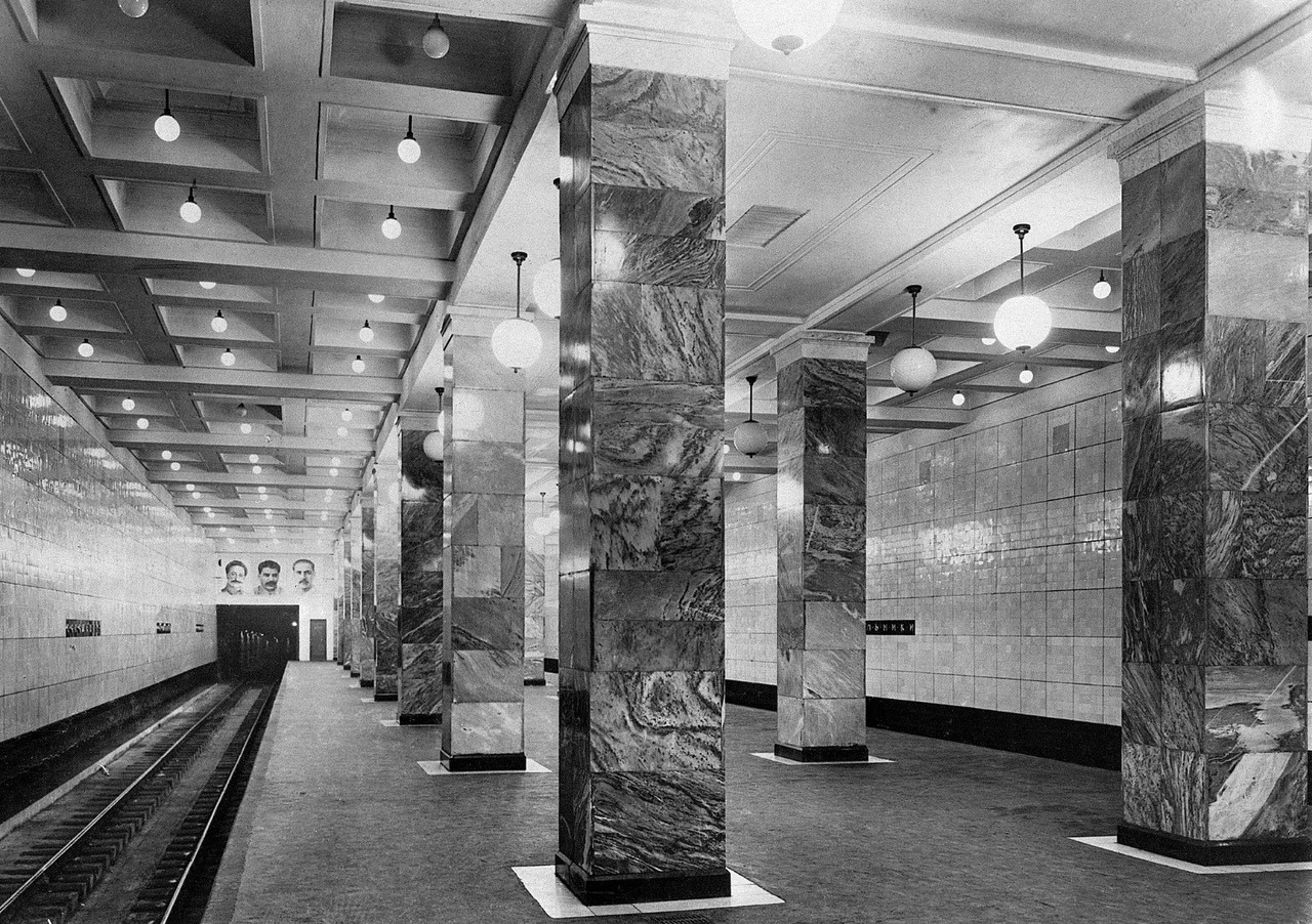 Sokolniki metro station in Moscow ft. portaits of Kaganovich, Stalin and Ordzhonikidze (1935)