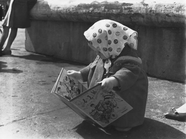 Such a cute little book reader :) Obviously, I googled the book she’s reading. It was quite hard to track, but it’s Sergey Mikhalkov’s “Jolly Travelers” from 1963. Yay.