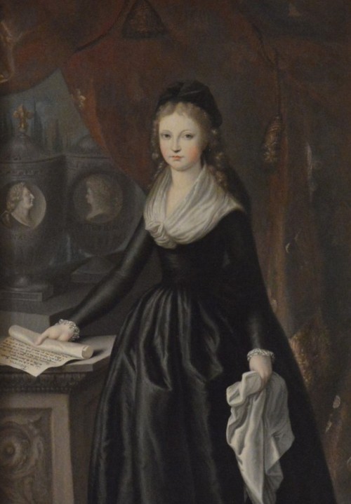 tiny-librarian:
“A portrait of Marie Therese Charlotte, dressed in mourning for her family. A pair of urns behind her depict her parents, and she holds a copy of her father’s last will and testament in her hand.
”