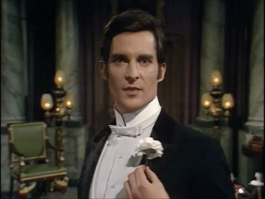 closeup of Jeremy Brett as Lord Goring in "An Ideal Husband"