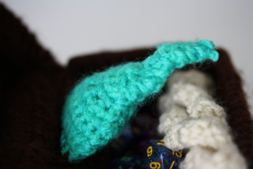 thatcrochetnerd:Mimic Dice BagI made a mimic dice bag to...