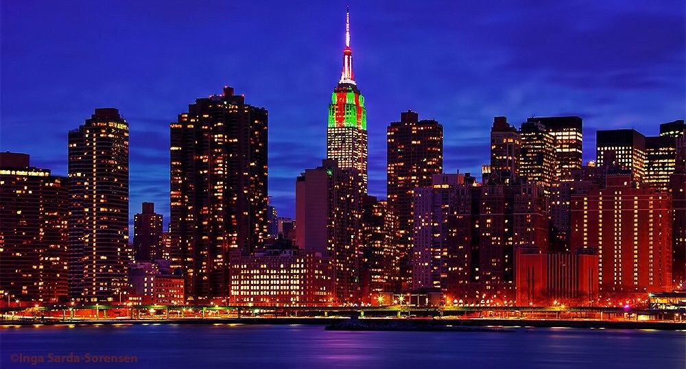 The Empire State Building looks festive & fabulous in the colors of