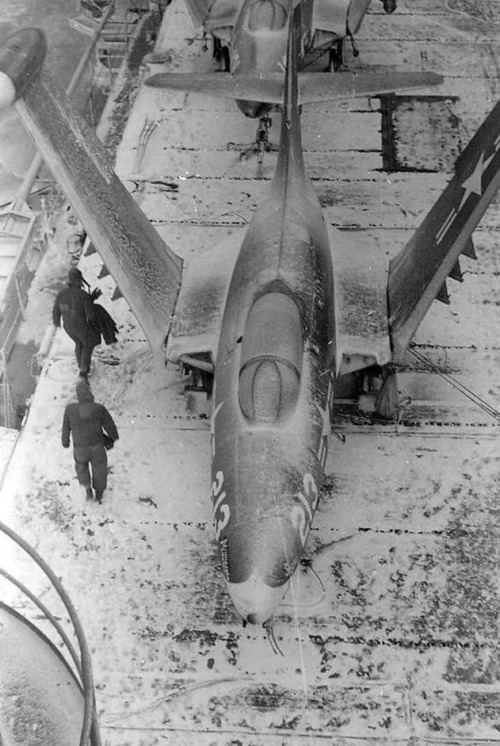 british-eevee:F9F panther on a snow covered deck of a aircraft...