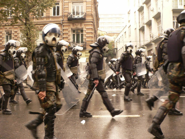 : Georgian riot police approach opposition...