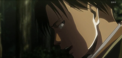 Levi smiles like Levi doesn't care