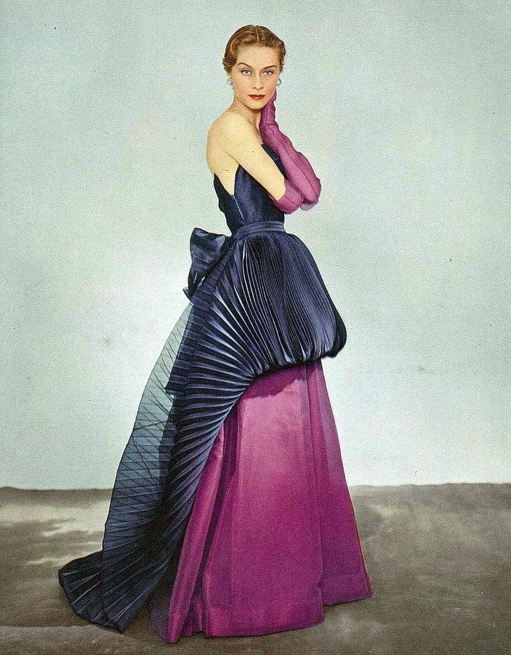 soleil du matin — Model in evening gown by Elsa Schiaparelli for...