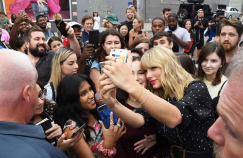 Taylor Swift visits the mural introducing her latest album “Lover” on August 23, 2019 in in the Brooklyn borough of New York...