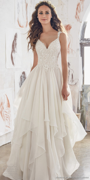 See more wedding dresses from this collection at Wedding...