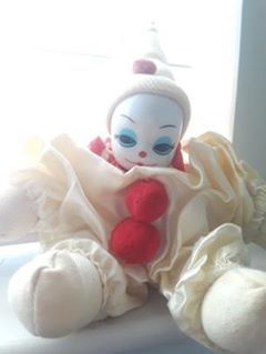 small but knowing clown doll