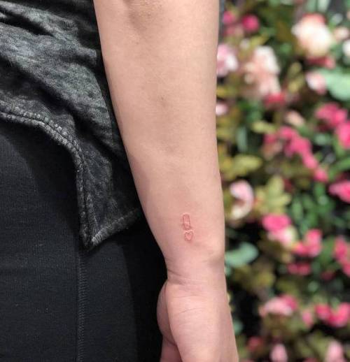 By Chang, done at West 4 Tattoo, Manhattan.... q;small;micro;card;ifttt;little;red;wrist;latin script;minimalist;tiny;experimental;gambling;game;letter;other;fine line;chang;line art;initials