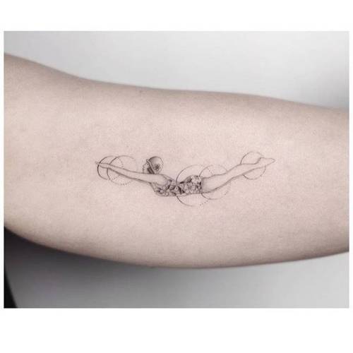 Fine line swimmer tattoo on the left inner arm. Tattoo artist:... fine line;small;jakubnowicz;inner arm;black;tiny;swimmer;little;profession