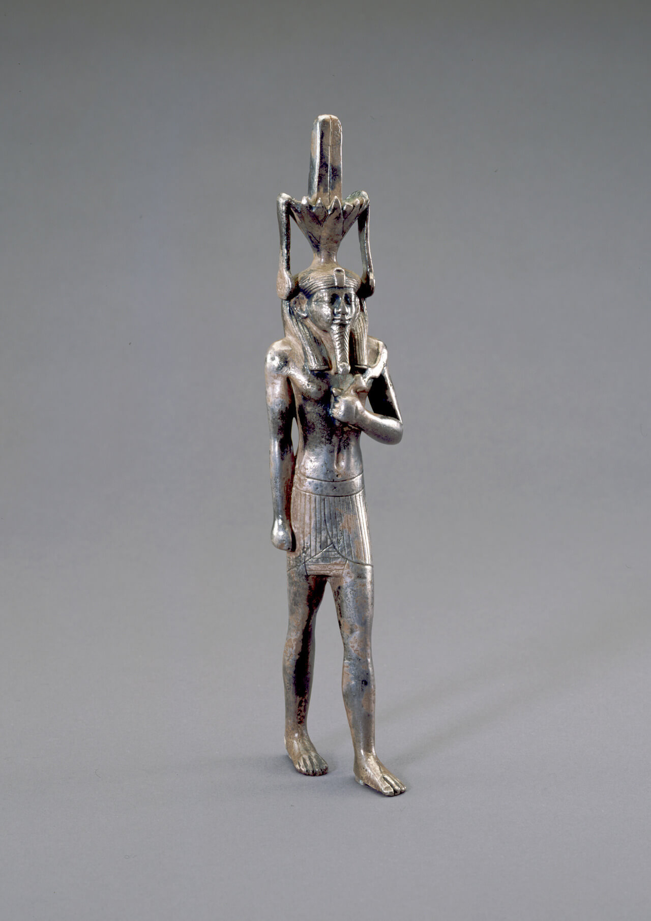 Statue of God Nefertem  Large silver statues are very rare in ancient Egypt. This may have been a figure from a temple of Nefertem. The god of perfume, Nefertem, was also a god of healing who was said to have eased the suffering of the aging sun god...