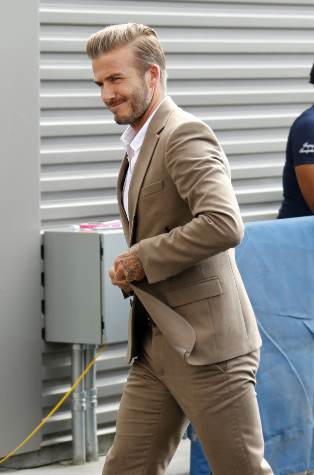 davidbeckhamhq: David Beckham arrives at the... - Black suit