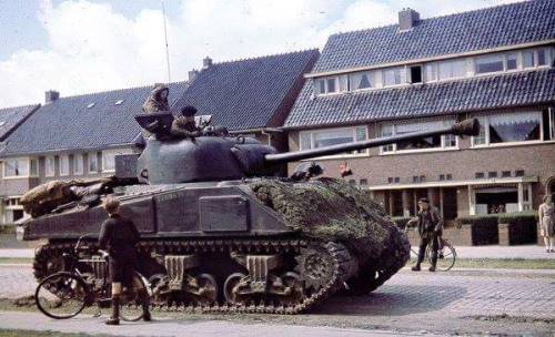 greasegunburgers:A color photo of an Canadian Sherman Firefly...