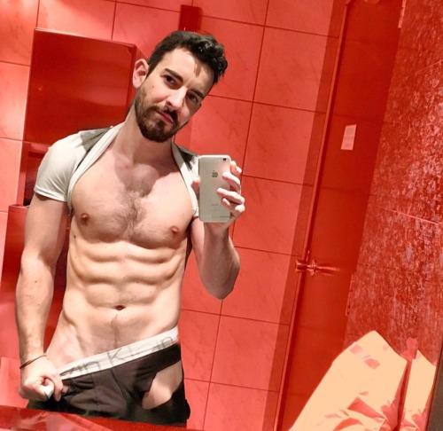 hot guy + a mirror + a phone