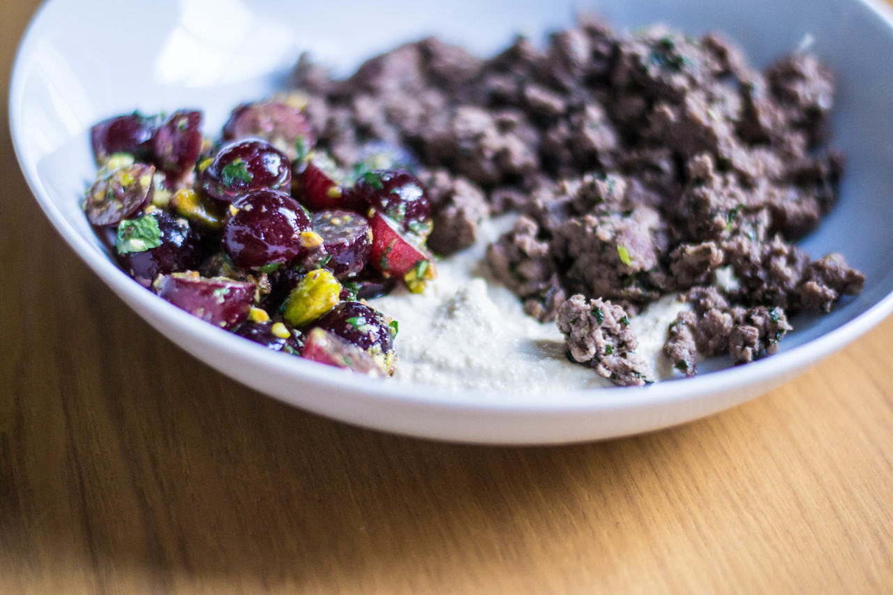 Grape-pistachio salad, ground lamb, and Zahav hummus tehina