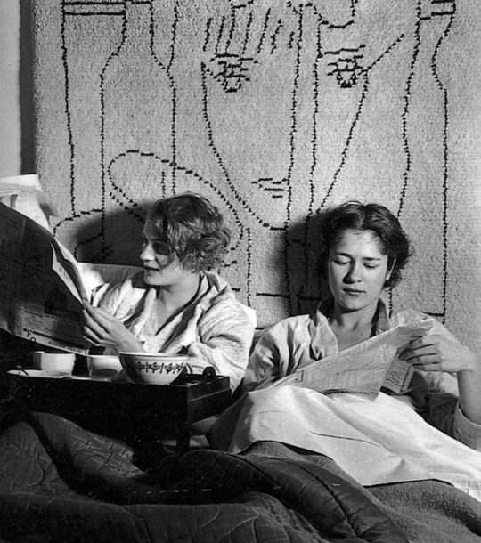 Lee Miller and her friend Tanja Ramm in Miller’s Paris studio sometime after 1929, having breakfast in bed in the company of a...