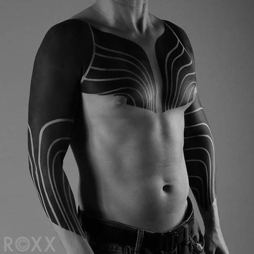 By Roxx, done at 2Spirit Tattoo SF, San Francisco.... tribal;neotribal;chest;huge;blackout;facebook;blackwork;twitter;roxx;sleeve