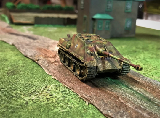 4 Jagdpanther moving down road, frontal view