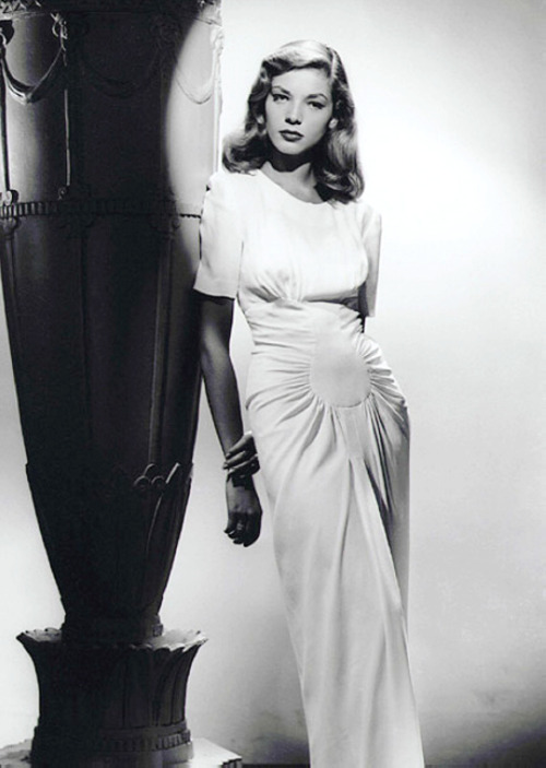 wehadfacesthen:Lauren Bacall, 1945, wearing a gown by Milo...