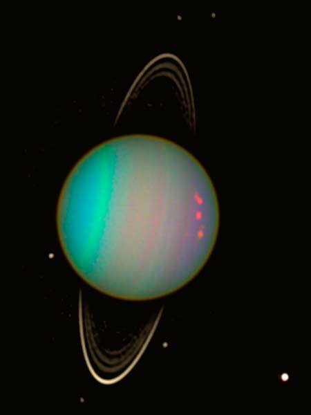 just–space:Rings and Moons Circling Uranus, taken by Hubble...