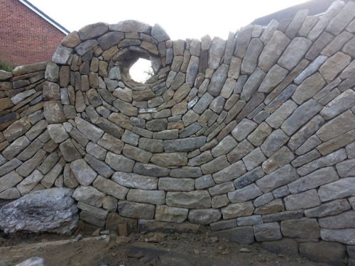 jedavu:Bricklayer Transforms Stone into Hypnotically Detailed...