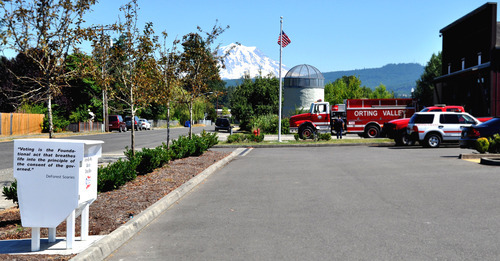 landscape of ballot drop box at fire station with mountain in background