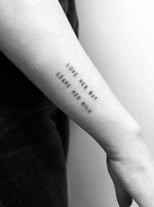 By Daniel Winter, done in Los Angeles. http://ttoo.co/p/75607 small;danielwinter;languages;tiny;ifttt;little;forearm;english;minimalist;quotes;love her but leave her wild;english tattoo quotes