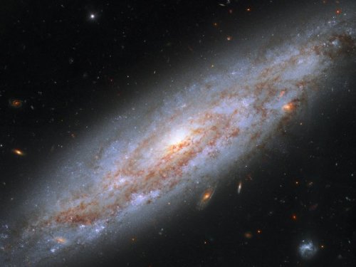 Galaxy full of cosmic lighthousesThis enchanting spiral galaxy...