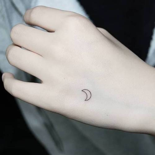 By Tattooist Ami, done in Suncheon. http://ttoo.co/p/35678 small;astronomy;micro;symbols;moon planetary symbol;tiny;planet symbol;ifttt;little;astrology;crescent moon;minimalist;moon;ami;hand