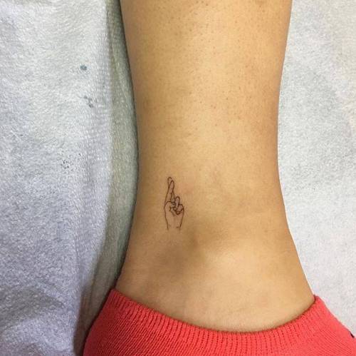 By OK, done in Manhattan. http://ttoo.co/p/136702 small;anatomy;micro;line art;crossed fingers;ok;tiny;ankle;ifttt;little;hand;fine line