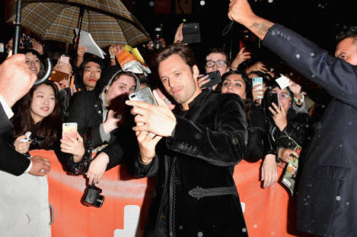 daybreak96:Seb stopping traffic to greet his fans in the rain at...