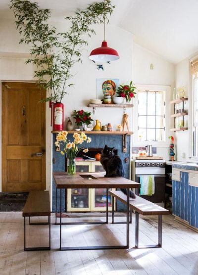 We love a kitchen that incorporates art, plants, and, yes, cats. Interior Design Home