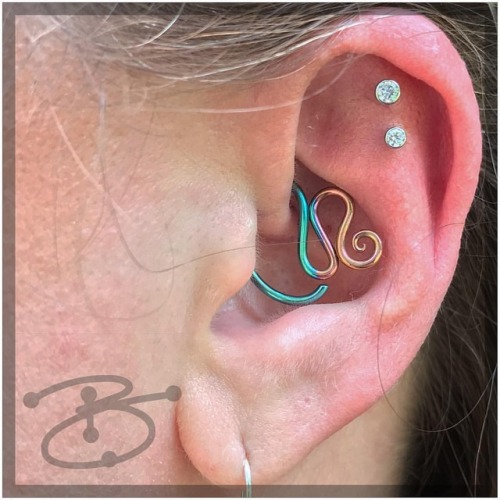 Some fun piercings from today. Fresh Daith with niobium jewelry...