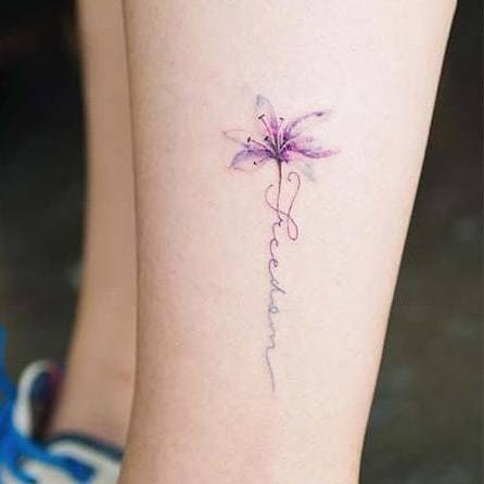 Johnny Fortune Tattoos — Gentle and minimal flower tattoo on leg...