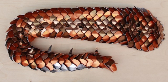 Armored Dragon Designs — This dragon tail has a fading amber color ...