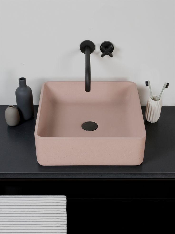 An elegant slim-edge counter top basin with subtle curves and contoured bowl. Minimal in the overall form, the refined finish and slim edge detail of the Arla basin enhances both the design and practicality. Available in two sizes; a compact cubic design and a rectangular style. Pictured in blush pink with taps by Watermark. #decoratingBathrooms An elegant slim-edge counter top basin with subtle curves and contoured bowl. Minimal in the overall form, the refined finish and slim edge detail of the Arla basin enhances both the design and practicality. Available in two sizes; a compact cubic design and a rectangular style. Pictured in blush pink with taps by Watermark. #decoratingBathrooms