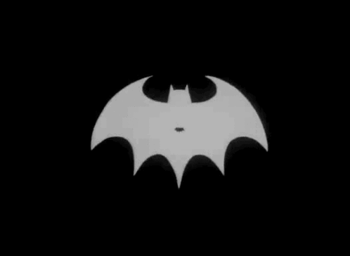 batman calls superman with bat signal gif