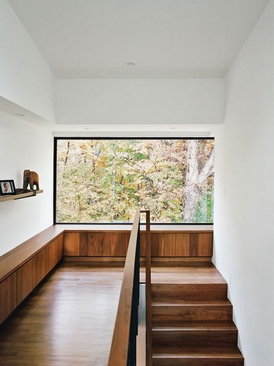 Modern home in North Carolina with built-in benches in the reading nook ( HID )