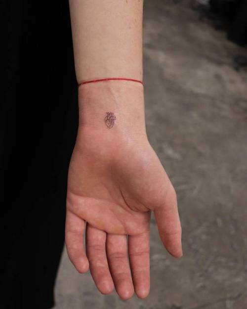 By Michelle Santana, done at Bang Bang Tattoo SoHo, Manhattan.... small;anatomy;micro;heart;line art;tiny;love;ifttt;little;wrist;michellesantana;anatomical heart;fine line