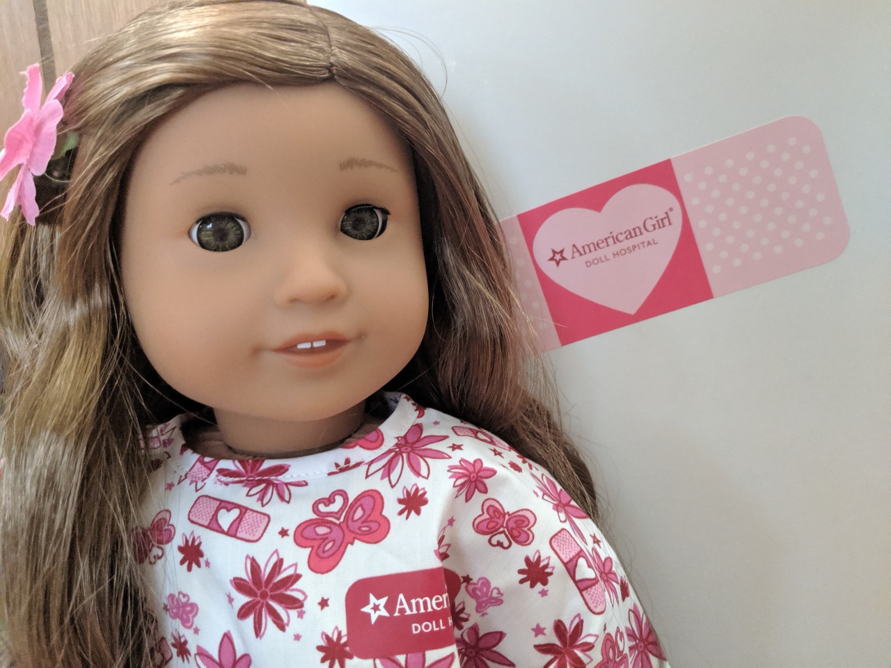 american girl doll hospital cost