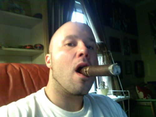 dutchbear74:Handsome cigar smoker