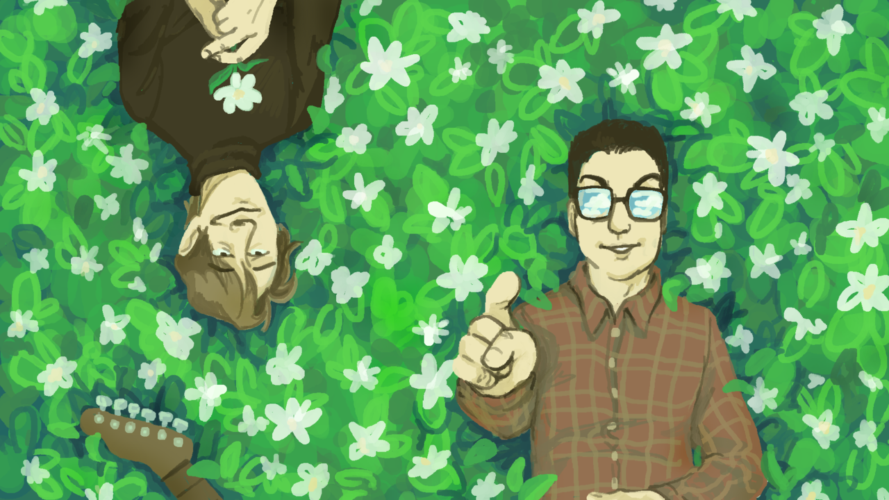 John and John lie down in a field of flowers.