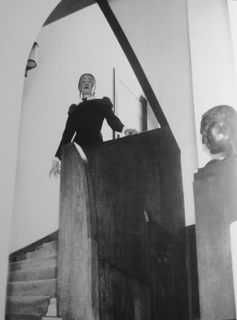Russian sculptor Dora Gordine on the stairs of Dorich House, London, around 1936