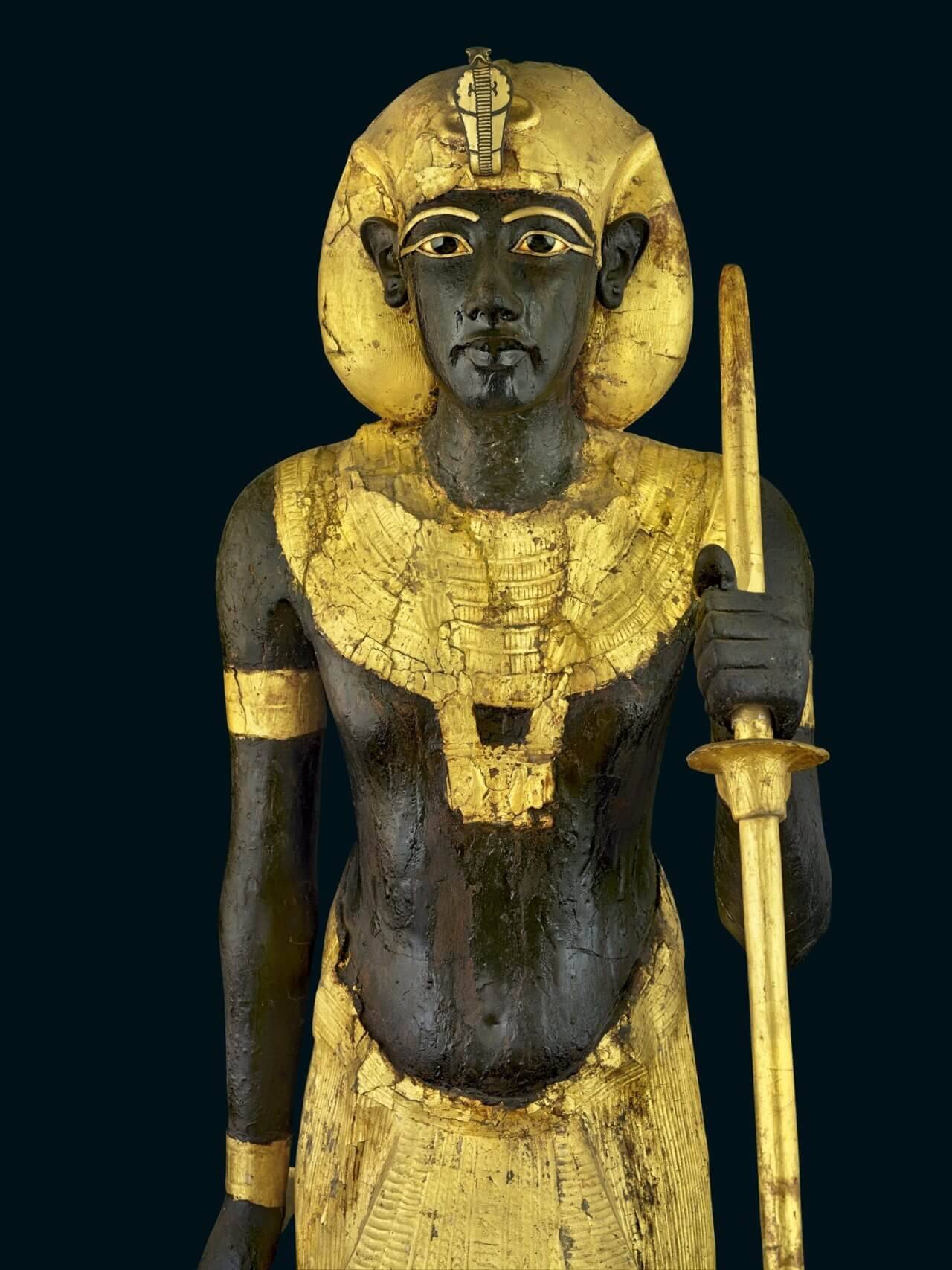 Guardian Statue of TutankhamunThis life-sized statue of King Tutankhamun was one of an identical pair that once flanked the entrance to the burial chamber and acted as guardians for the tomb and as Ka, or spirit, statues.Made of wood, the statue is...